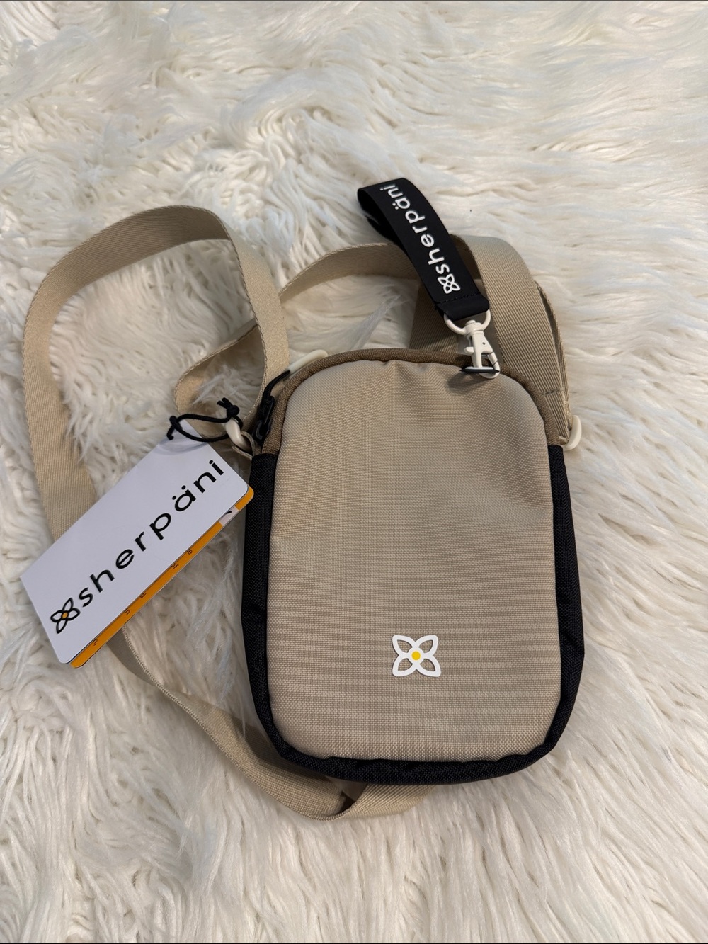 Sherpani Beige and Black Compact Crossbody Pouch brand new - Picture 1 of 8